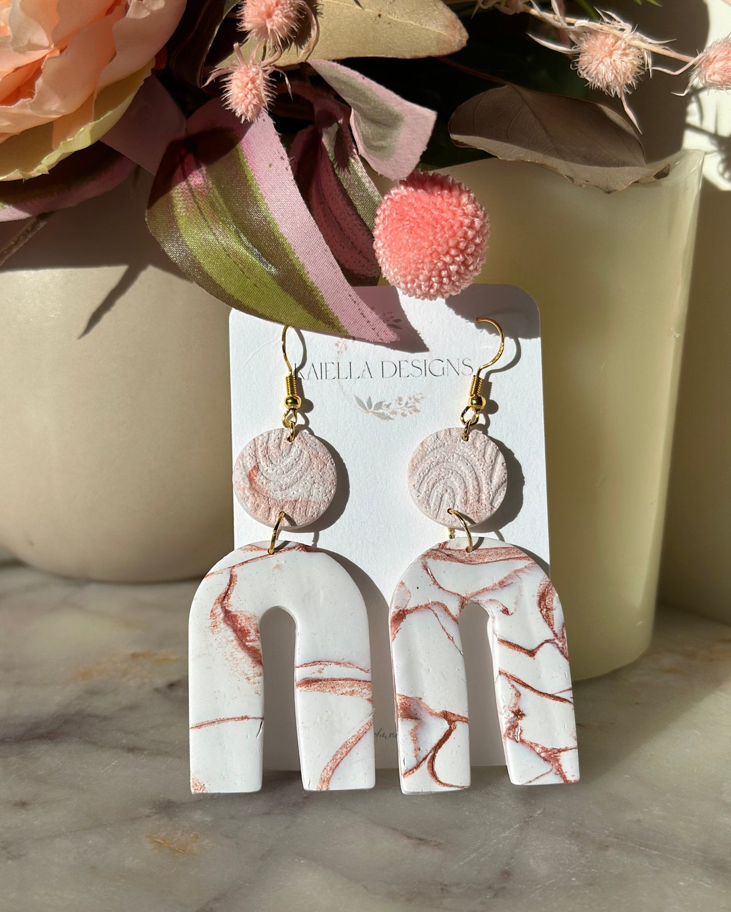 Large dangles - White with a pink & bronze marble.