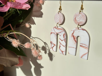 Large dangles - White with a pink & bronze marble.